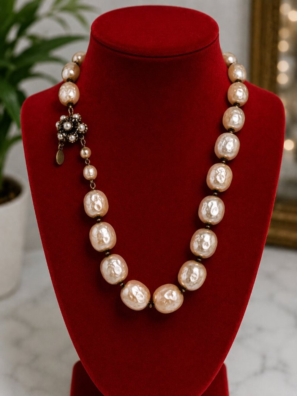Miriam Haskell statement necklace featuring oversized faux baroque pearls.